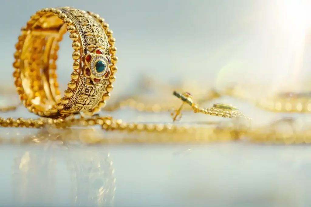  gold jewelry on table
