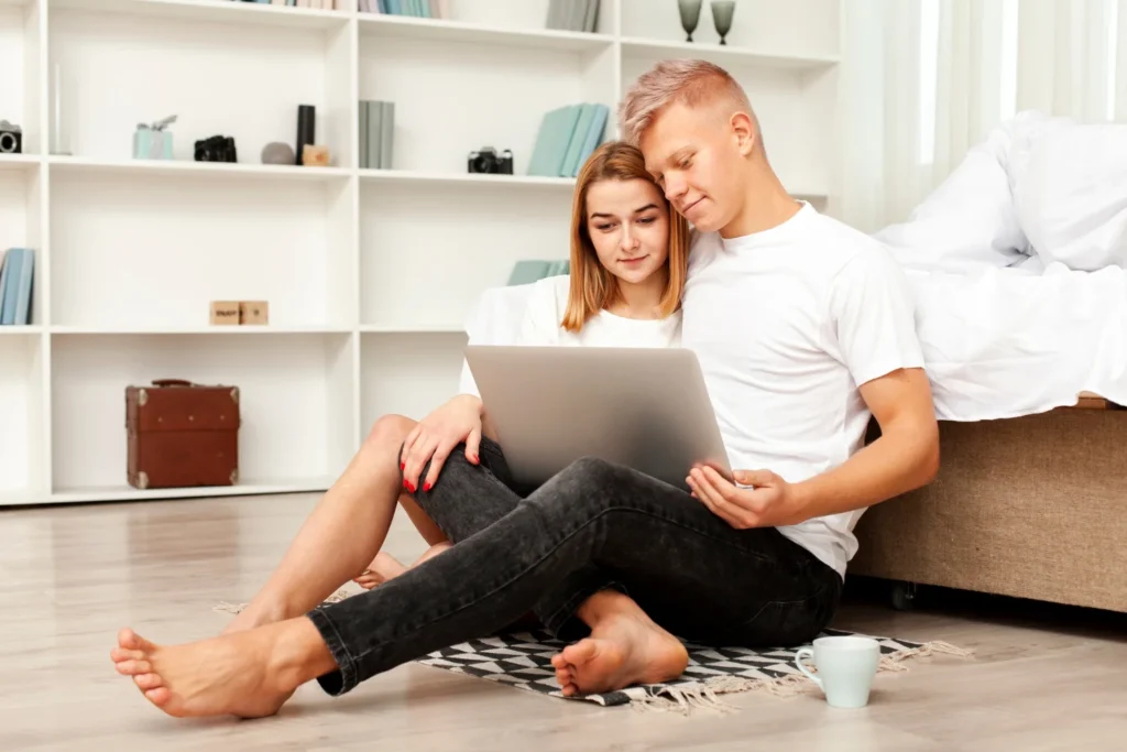 couple watching laptop